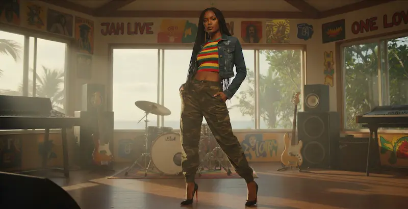 Fashion model wearing reggae attire-in a Jamaican music bar